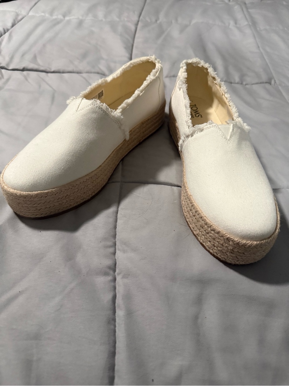 Toms White Canvas Platform Espadrille Slip-Ons with Frayed Trim. Never worn.